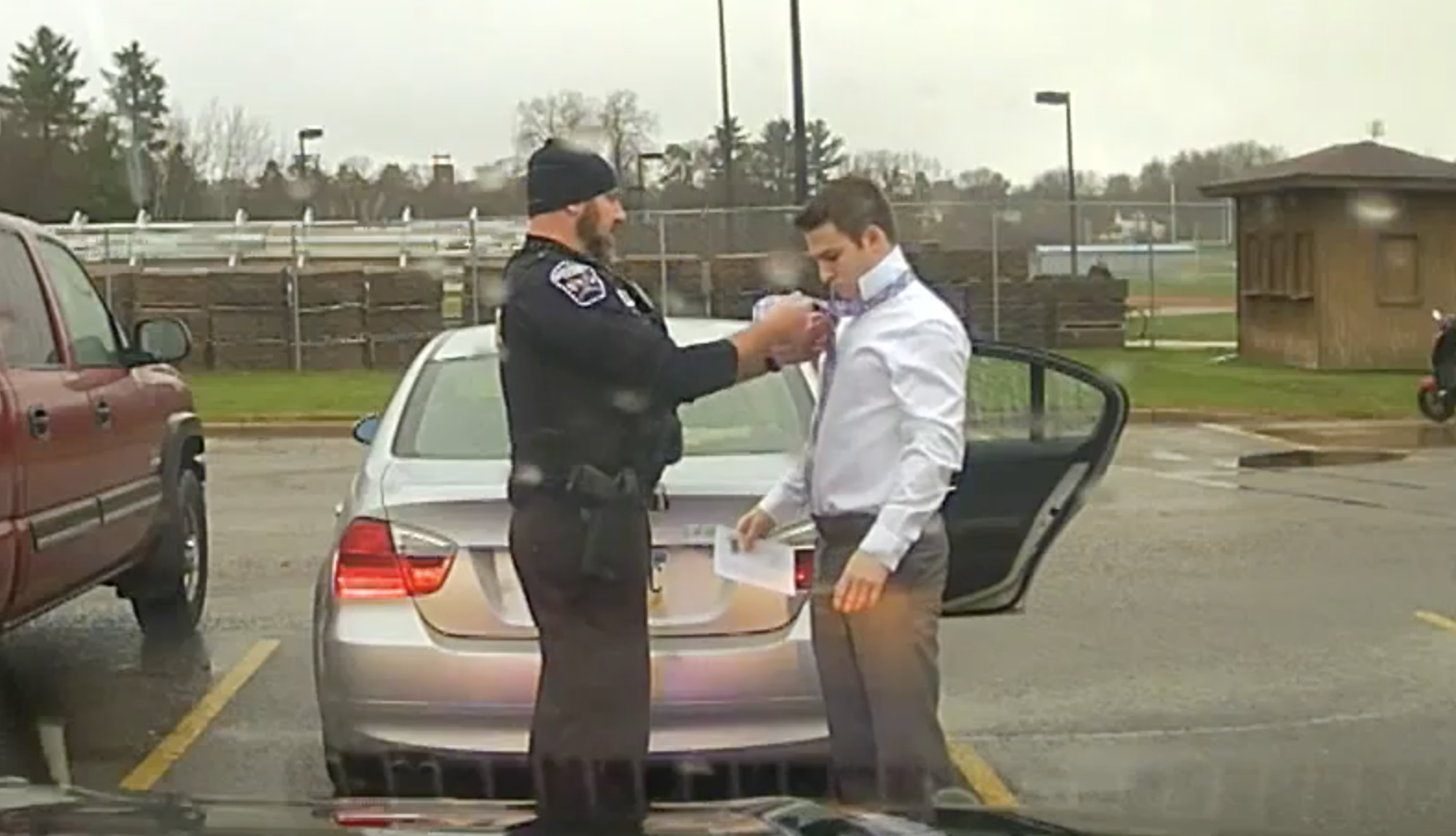 Menomonie, WI officer on traffic stop helps kid with his tie Rescue Humor