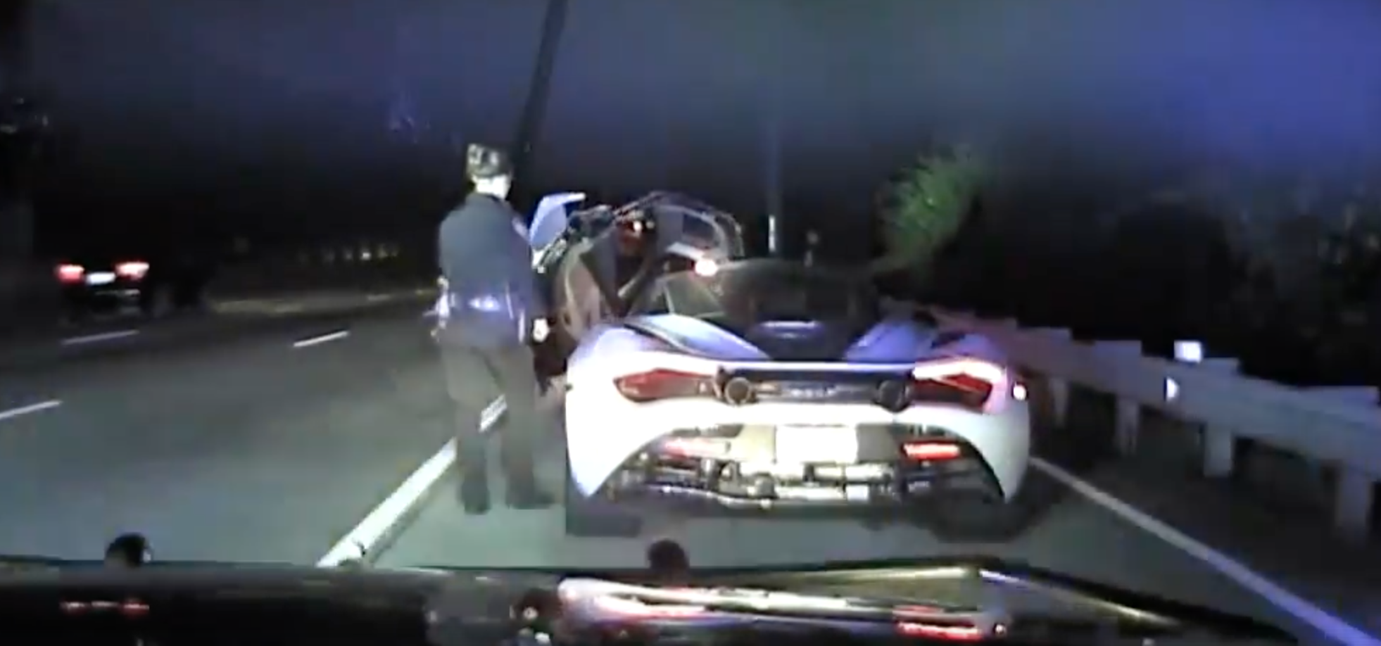 Dash cam shows LEO in a Charger chases down McLaren sports car at
155MPH