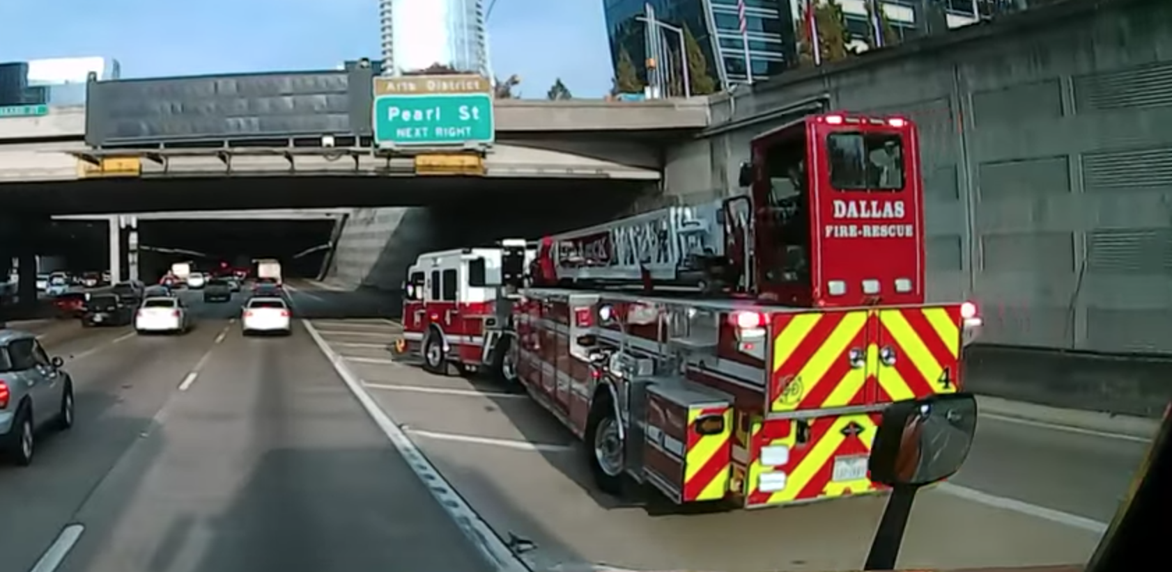 Dash Cam footage of Dallas Fire tiller drifting in traffic