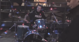 cop plays drums
